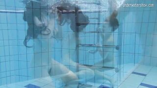 Two hot lesbians in the pool loving eachother