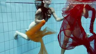 Two redheads swimming SUPER HOT!!!