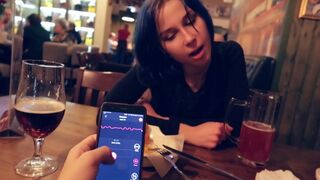 I took control of my stepsister's sex toy in the bar and brought her to orgasm.