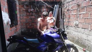 The neighbor washes my motorcycle so he can have sex with me afterwards.