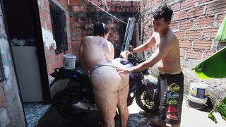 The neighbor washes my motorcycle so he can have sex with me afterwards.