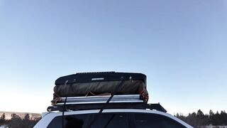 Mountain cutie shows off rooftop tent set up and light up ass-plug