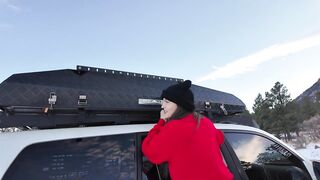 Mountain cutie shows off rooftop tent set up and light up ass-plug