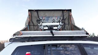 Mountain cutie shows off rooftop tent set up and light up ass-plug