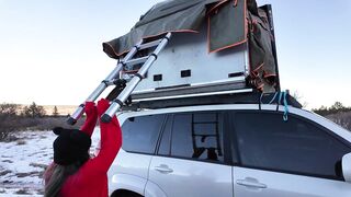Mountain cutie shows off rooftop tent set up and light up ass-plug