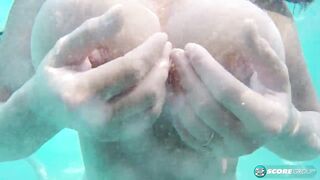three sets of massive, natural tits underwater