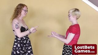 They dive into a Strip Mogadishu game with provocative poses