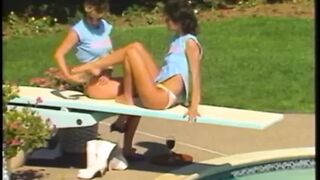 Hot brunette hottie rides her friend's huge strap-on with her tight vagina