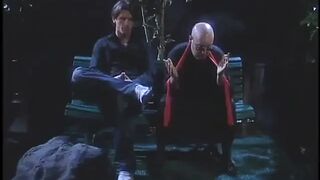 Golden-haired in leather deep throats white jock then gets fucked on sofa