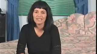 Big titted milf is filling her pussy with a sex tool