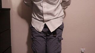 Despairing and manacled guy wets his pants