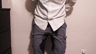 Despairing and manacled guy wets his pants