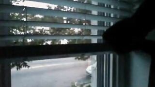 House window penis flashing