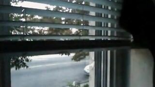 House window penis flashing