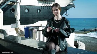 Young Russian Woman Smokin' Cigarette Outdoor Terrace