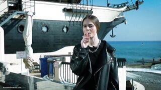 Young Russian Woman Smokin' Cigarette Outdoor Terrace