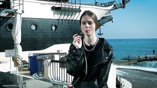 Young Russian Woman Smokin' Cigarette Outdoor Terrace