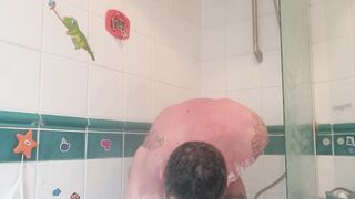 Athletic tattooed stud takes hot shower after the gym