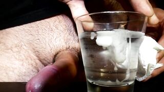 Closeup Thick Cumshot Into a Glass of Cold Water