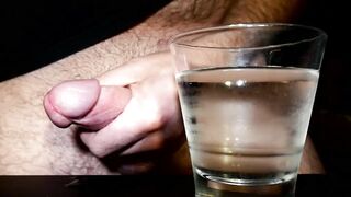 Closeup Thick Cumshot Into a Glass of Cold Water