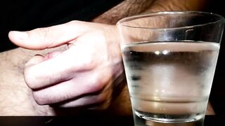 Closeup Thick Cumshot Into a Glass of Cold Water