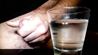 Closeup Thick Cumshot Into a Glass of Cold Water