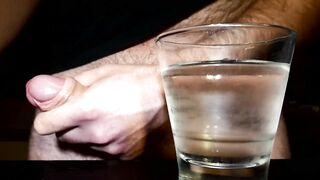 Closeup Thick Cumshot Into a Glass of Cold Water