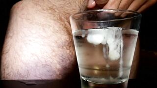 Closeup Thick Cumshot Into a Glass of Cold Water