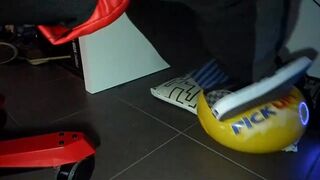Male shoeplay and stomping stuff at home in Nikes, Vans, blue stiped socks
