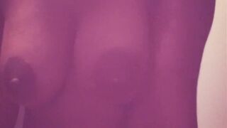 Ebony milf playing with her titts