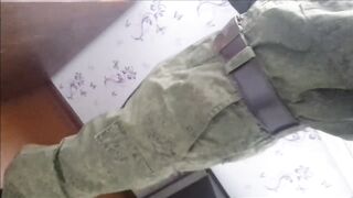 Russian soldier smokes, spits, and masturbates his obscene jock and cums on his army shoes