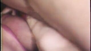 Redhead masturbates in couch with banana in vintage porn