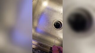 Messy void urine into the kitchen sink