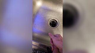 Messy void urine into the kitchen sink