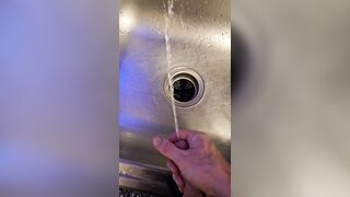 Messy void urine into the kitchen sink