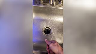 Messy void urine into the kitchen sink