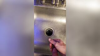 Messy void urine into the kitchen sink