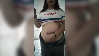 BBW playing with huge abdomen while smokin'