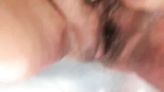 aged Latin chick woman with shaggy pussy peeing pissing closeup