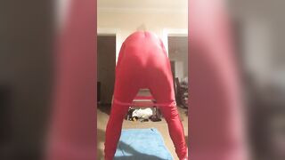 Yoga resistance band wearing red spandex and wig (Sexual Edition)