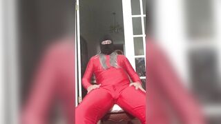 Yoga resistance band wearing red spandex and wig (Sexual Edition)